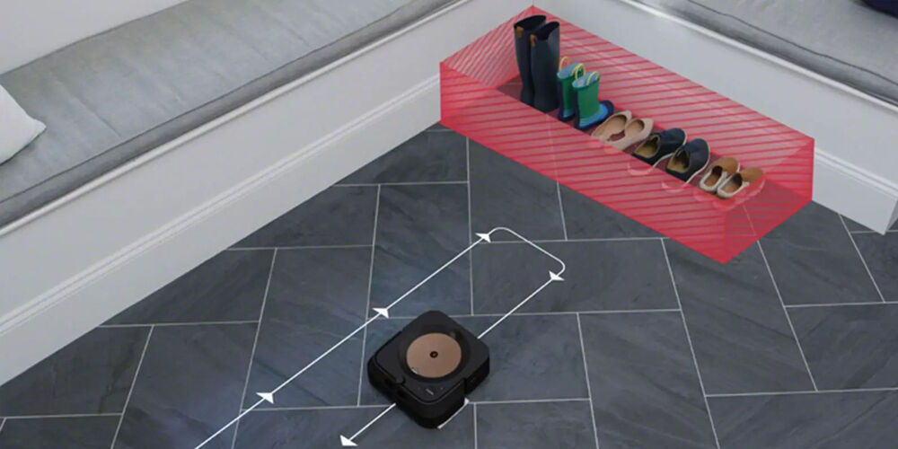 Een Roomba die een verzameling schoenen vermijdt